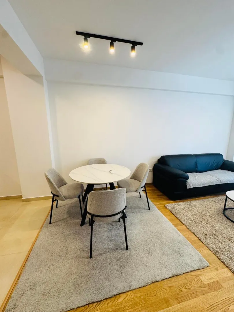 Living room with a dining table and chairs.