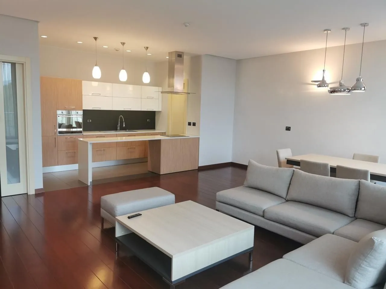 Bright and spacious open-plan living room and kitchen.