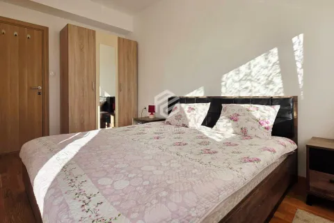 Furnished bedroom with a double bed, wardrobe, and nightstands. - image 19