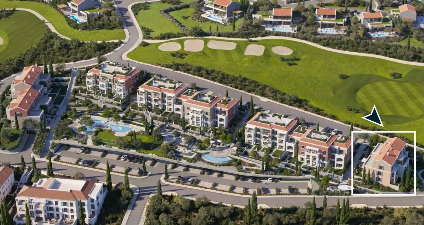 Aerial view of a modern residential complex with swimming pools.