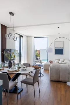 Spacious bright living room with dining area and access to the terrace with pool. - image 8