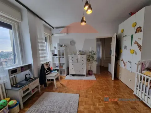 Children's bedroom with a crib, wardrobes, and toys. - image 4