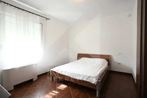 Bedroom with a double bed, window, and tiled flooring. - image 11