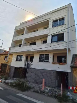 View of the facade and entrance of the residential building. - image 2