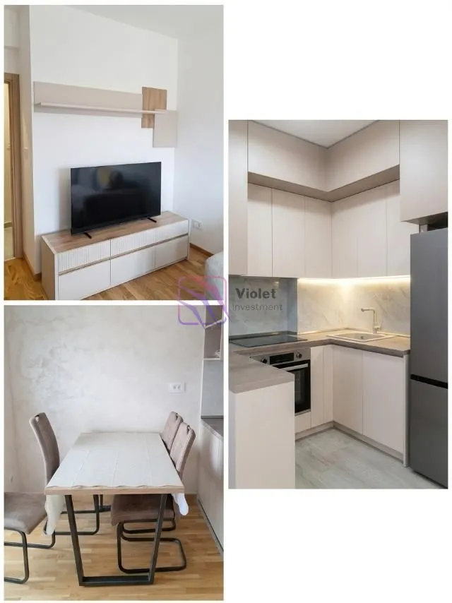 Combined living room with dining area and kitchen.