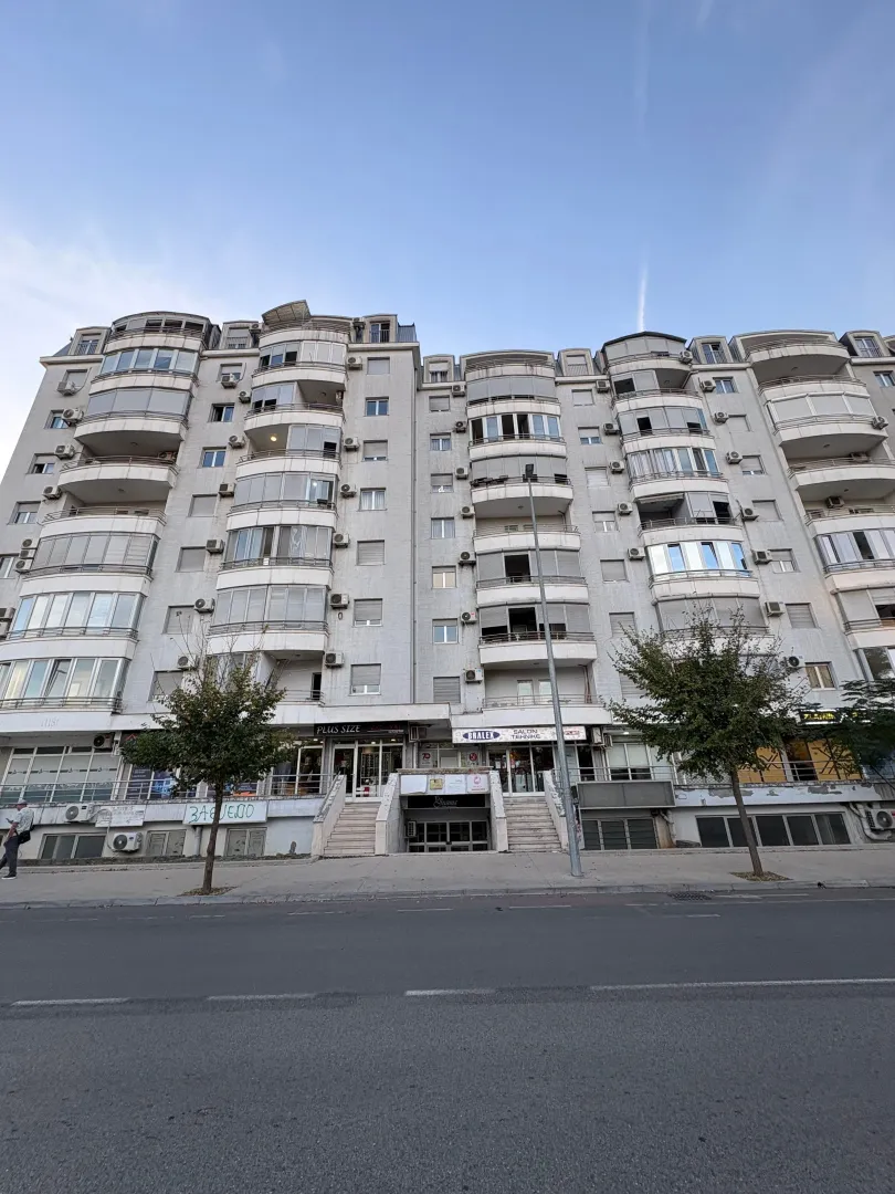 View of the multi-family residential building facade from the street.