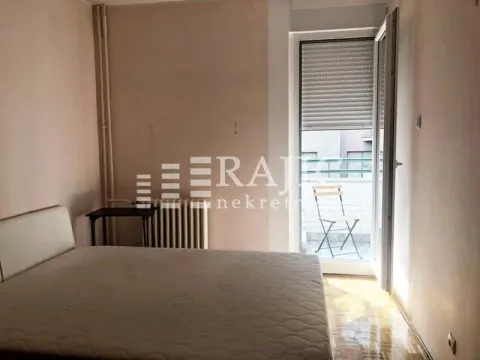 Bedroom with a double bed and access to the terrace. - image 5