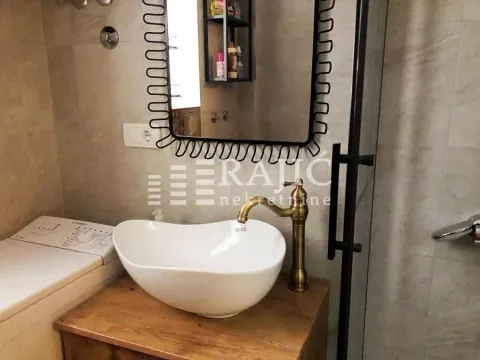 Modern bathroom with a sink and mirror. - image 2