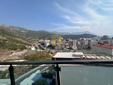 View from the terrace towards the city and mountains. - image 2