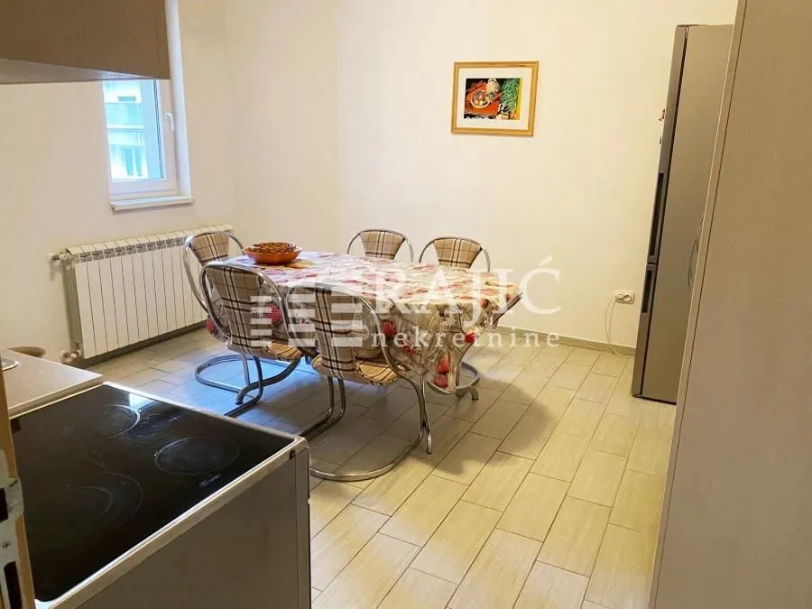 Dining area with a dining table and chairs.