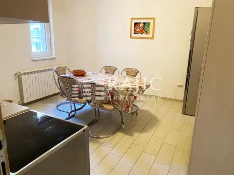 Dining area with a dining table and chairs. - image 10