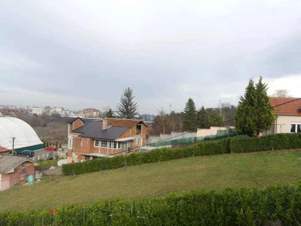 View from the yard of surrounding houses and landscape.