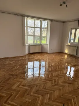 Bright empty room with polished parquet flooring. - image 9
