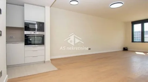 Modern kitchen with built-in units and appliances. - image 4