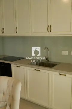 View of the kitchen cabinets with a sink and countertop. - image 14