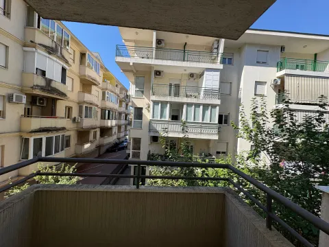View from the balcony overlooking surrounding residential buildings. - image 6