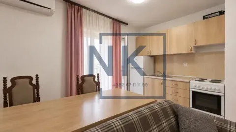 Living room with dining area and an open kitchen. - image 2