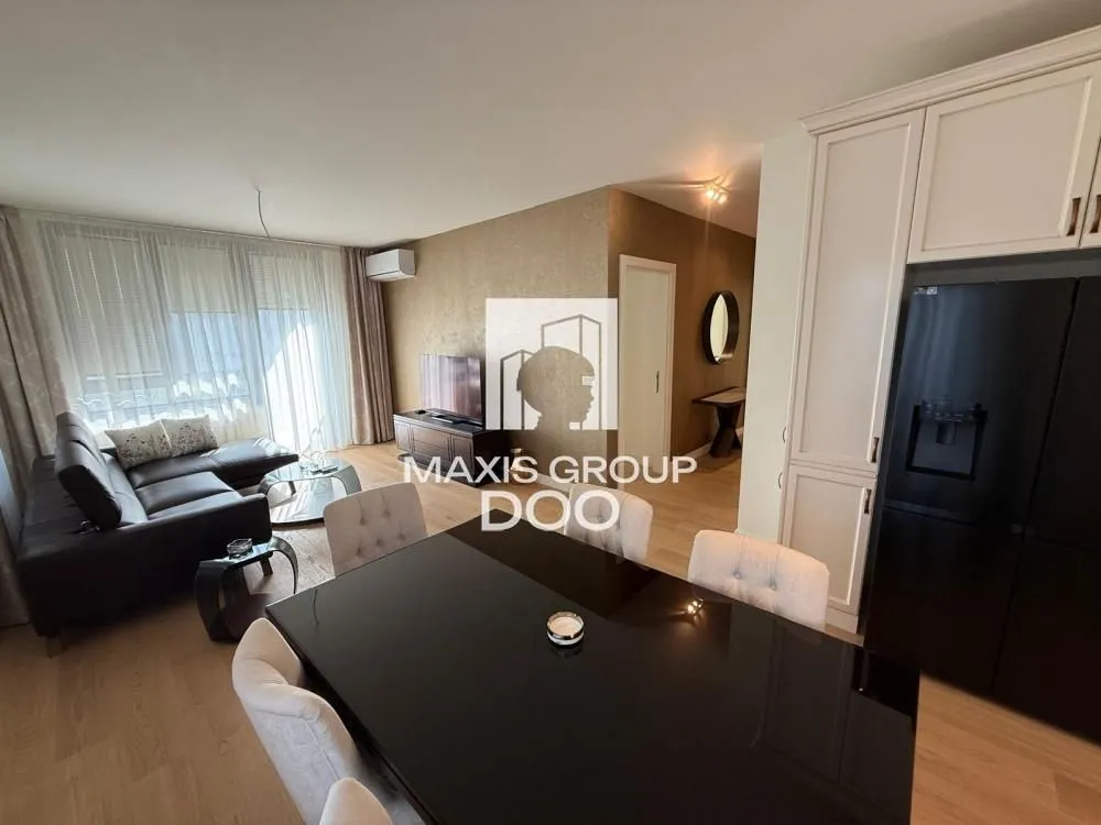 Living room with a dining area and seating set.