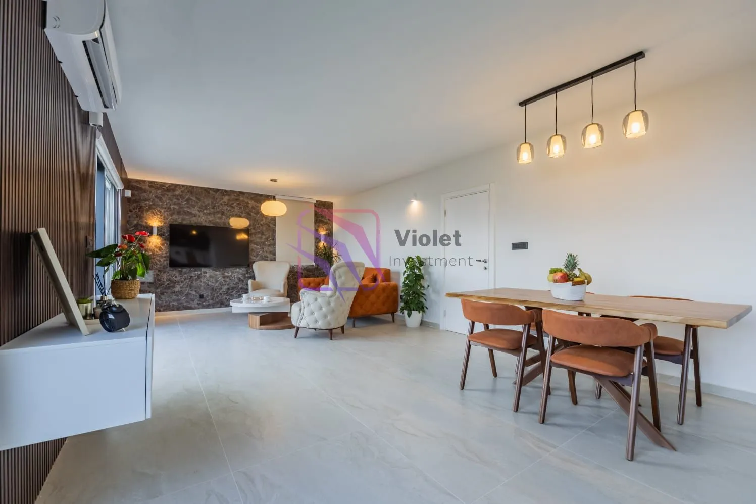 Spacious living room with a dining area and modern furniture.