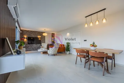 Spacious living room with a dining area and modern furniture. - image 19