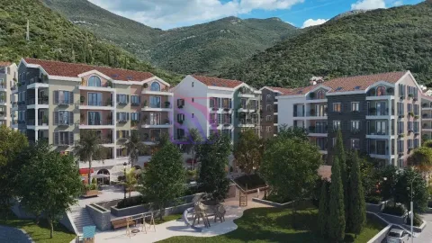 Pogled na stambeni kompleks sa uređenim dvorištem i igralištem. - image 5