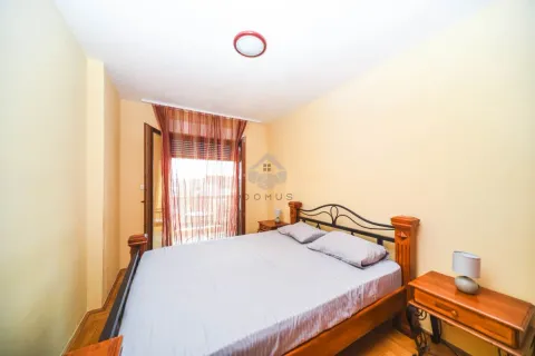 Bedroom with a double bed, wooden bedside tables and access to the terrace. - image 7