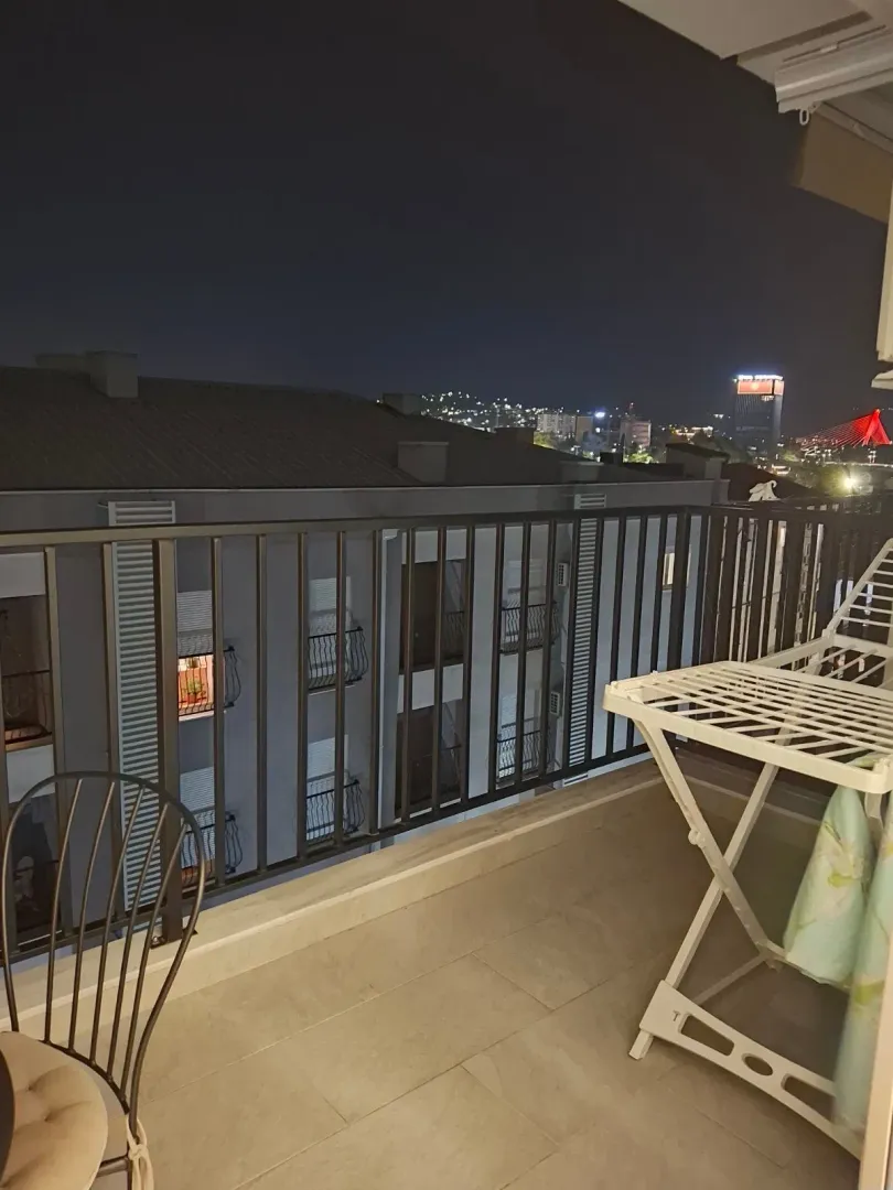 View of the city from the terrace at night.