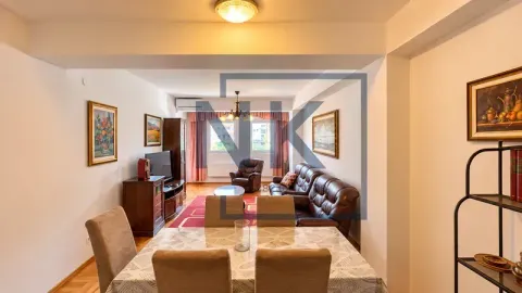 Living room with a dining area and seating furniture. - image 4