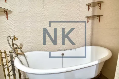 Bathroom with a freestanding bathtub and vintage faucets. - image 10