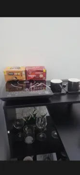 Detailed view of an interior section with coffee and glasses on a table. - image 5