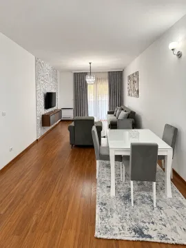 Spacious living room with a dining area and modern furniture. - image 3