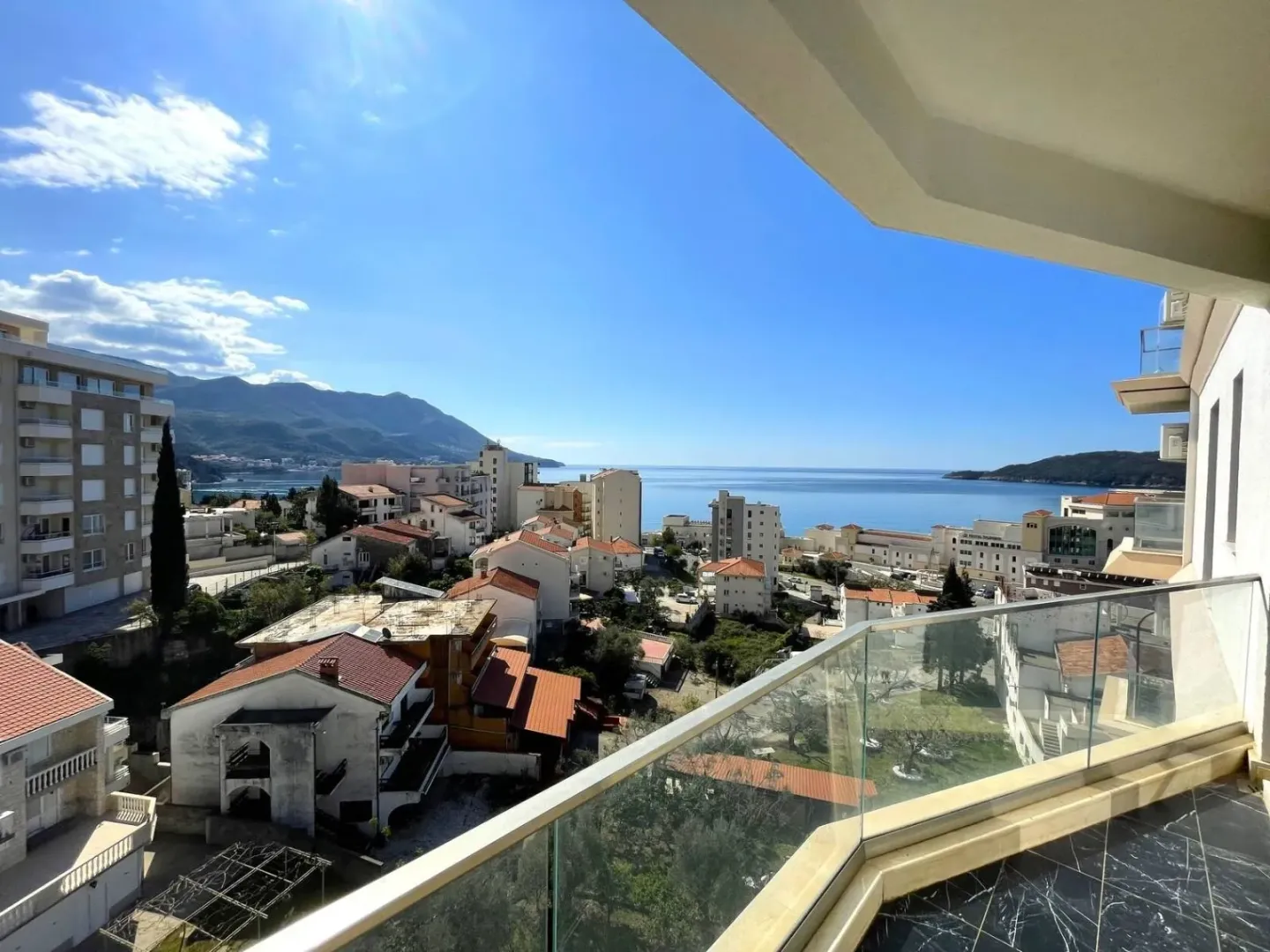 View from the terrace overlooking the town, mountains, and the sea.