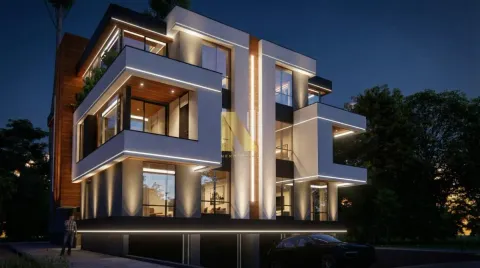 Spoljašnji izgled moderne višespratne zgrade sa osvetljenjem noću. - image 7