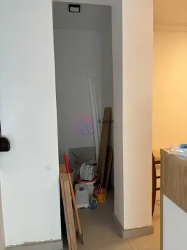 View of an interior section with construction materials and tools during renovation. - image 7
