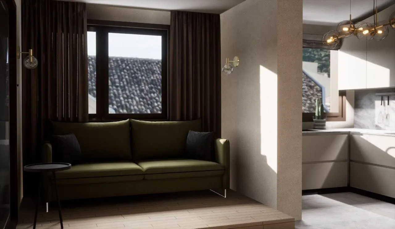 Living room with a green sofa and a window view.