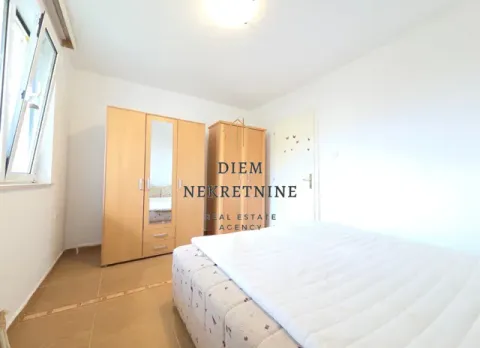 Furnished bedroom with wardrobes and a bed. - image 10