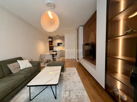 Modern living room connected to the dining area and kitchen. - image 3