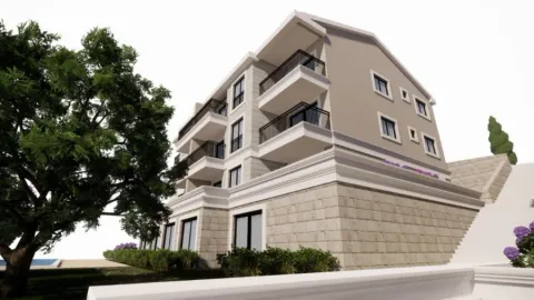 Render of a new residential building with balconies and landscaped yard. - image 2