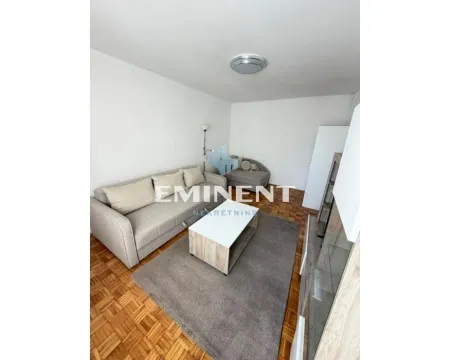 Living room with a sofa set and a coffee table. - image 6