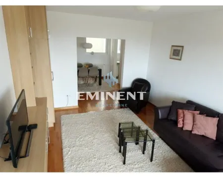 Living room with furniture and a view of the dining area. - image 4