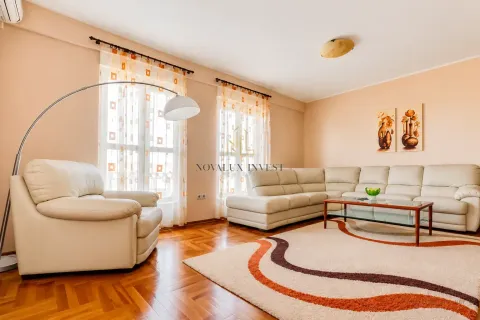 Living room with sofa, armchair, coffee table and parquet flooring. - image 2