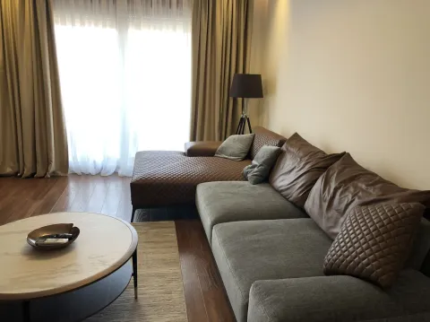 Bright living room with a modern corner sofa. - image 7