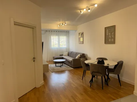 Spacious living room with dining area and modern furniture. - image 4