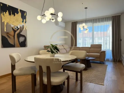 Living room with dining area and modern furniture. - image 22