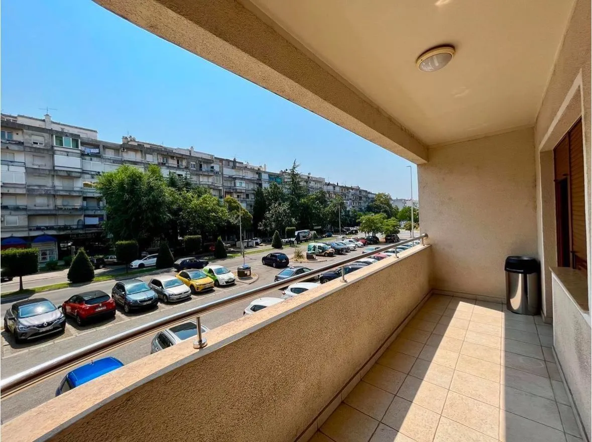 Spacious terrace with a street view.