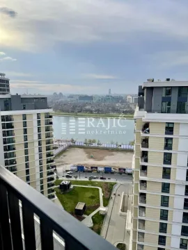 View from the terrace of the river and surrounding buildings. - image 16