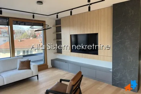 Living room with sofa, TV unit and access to the terrace. - image 2