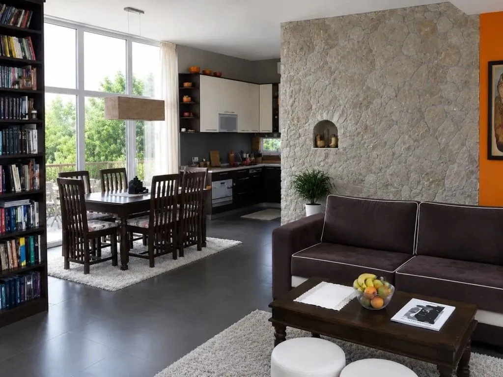 Open-plan living room with dining area and kitchen.