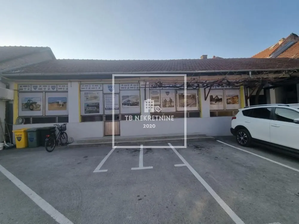 Exterior of the commercial space with parking in front.
