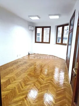 Empty room with parquet flooring and white walls. - image 8